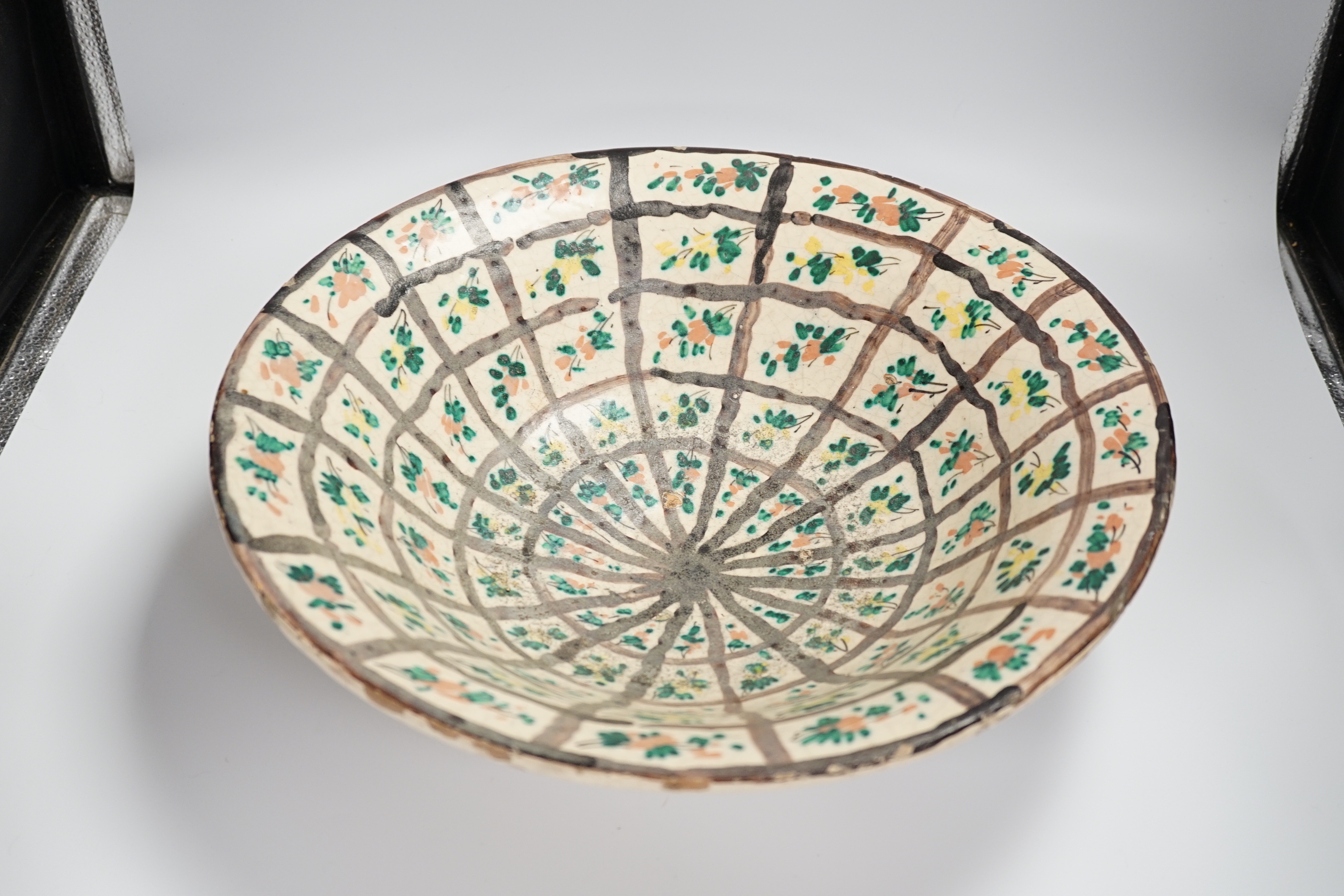 A large Persian glazed pottery bowl, 39cm diameter